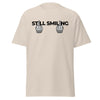T-Shirt Classic - Still Smiling black ein Produkt von SCHIETKRAM
