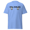 T-Shirt Classic - Still Smiling black ein Produkt von SCHIETKRAM