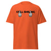T-Shirt Classic - Still Smiling black ein Produkt von SCHIETKRAM