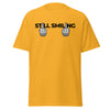 T-Shirt Classic - Still Smiling black Gold ein Produkt von SCHIETKRAM
